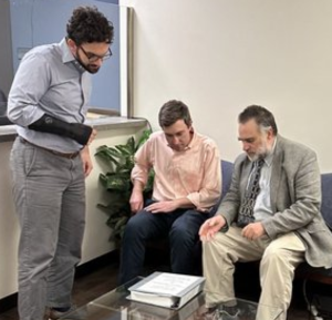 Hugh Esco, party Secretary files with Georgia Elections Division, a ballot access affidavit under state's new 20 state rule, with supporting documentation.  Also pictured are Nicolas Northen (Assistant Deputy Director) and Blake Evans (Director).  